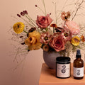 Gather gift set with seasonal flower arrangement, candle and body spray in Toronto