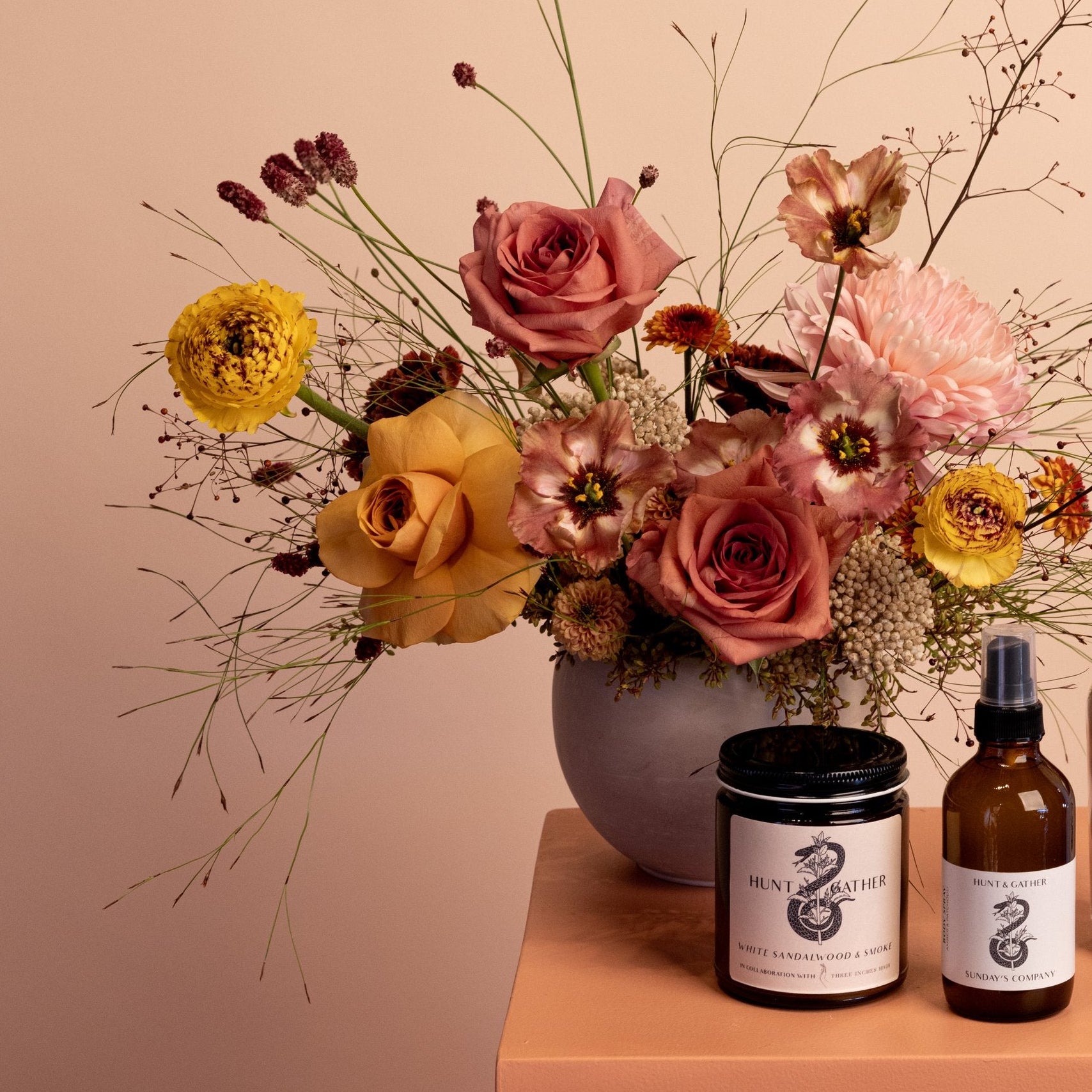 Gather gift set with seasonal flower arrangement, candle and body spray in Toronto
